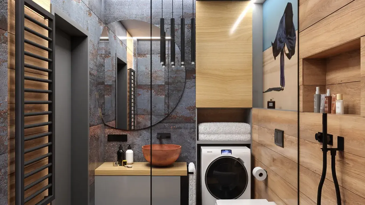 Nowoczesna łazienka inspiracje: beton, drewno, miedź i pralka. Okrągłe lustro, designerska umywalka i stylowe dodatki.